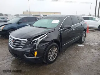 2017 Cadillac XT5 Luxury FWD with VIN 1GYKNBRS8HZ209286, listed as a IAAI auction lot 41405337 with 142,280 mi miles. Bid and sale history available at carsss.com. Image 2.