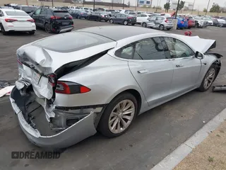 2017 Tesla Model S 60 with VIN 5YJSA1E17HF189627, listed as a IAAI auction lot 41891766 with 106,003 mi miles and . Bid and sale history available at DreamBid. Image 4.