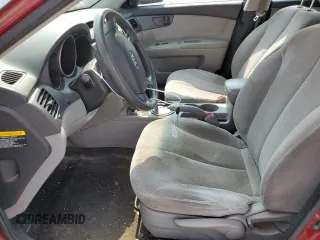 2009 Kia Optima LX z VIN KNAGE228795334599, wystawiony jako Copart lot #59276515 z przebiegiem 180 399 mil mil oraz Szkoda całkowita • Salvage title. Historia ofert i sprzedaży dostępna na DreamBid. Obrazek 7.