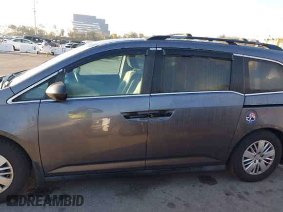 2015 Honda Odyssey LX с VIN 5FNRL5H27FB068761, выставлен на аукционе IAAI как лот 41479420 с пробегом 84 532 миль миль и . История ставок и продаж доступна на DreamBid. Изображение 14.