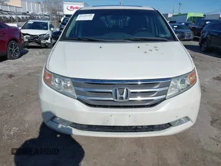 2012 Honda Odyssey Touring with VIN 5FNRL5H96CB010696, listed as a IAAI auction lot 41605868 with 109,411 mi miles and . Bid and sale history available at carsss.com. Image 12.