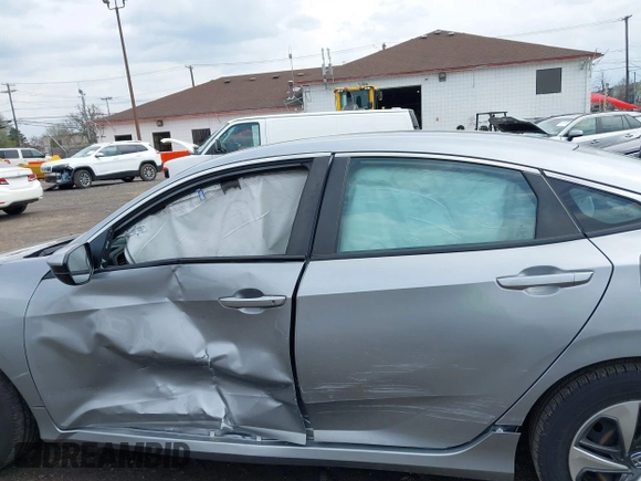 2020 Honda Civic LX with VIN 2HGFC2F65LH544133, listed as a IAAI auction lot 42148441 with 49,063 mi miles and . Bid and sale history available at DreamBid. Image 14.