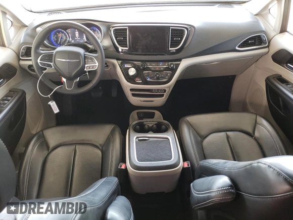 2023 Chrysler Pacifica Touring L with VIN 2C4RC1BG1PR581376, listed as a Copart auction lot 59901915 with 57,411 mi miles and Salvage title. Bid and sale history available at DreamBid. Image 8.