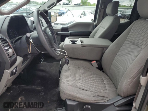 2017 Ford F-150 XL with VIN 1FTEX1EP0HFC32474, listed as a Copart auction lot 63428025 with 97,151 mi miles and Salvage title. Bid and sale history available at DreamBid. Image 7.