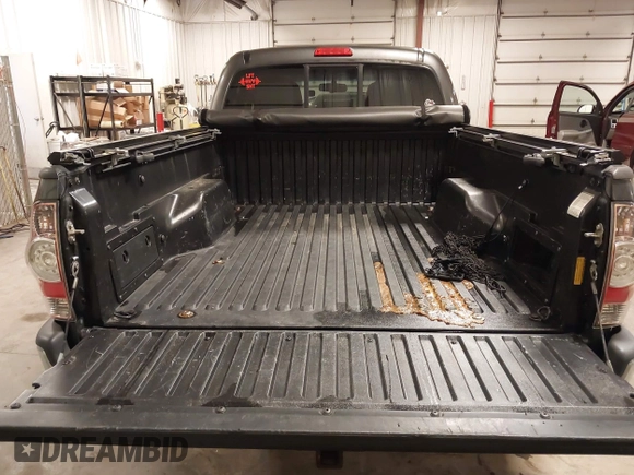2013 Toyota Tacoma with VIN 3TMMU4FN9DM052987, listed as a IAAI auction lot 42325979 with 200,379 mi miles and . Bid and sale history available at DreamBid. Image 17.