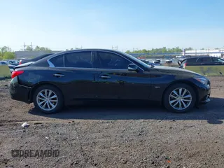 2016 Infiniti Q50 with VIN JN1EV7AR2GM341323, listed as a IAAI auction lot 42132950 with 104,943 mi miles and . Bid and sale history available at DreamBid. Image 13.