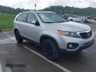 2011 Kia Sorento LX with VIN 5XYKT4A14BG074310, listed as a IAAI auction lot 42119815 with 215,660 mi miles. Bid and sale history available at carsss.com. Image 1.