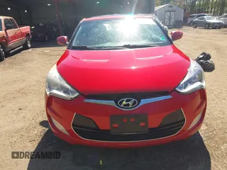 2012 Hyundai Veloster w/Gray Int z VIN KMHTC6AD0CU048339, wystawiony jako IAAI lot #42040008 z przebiegiem 117 895 mil mil oraz . Historia ofert i sprzedaży dostępna na DreamBid. Obrazek 13.
