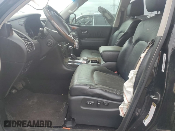 2012 Infiniti QX56 7-passenger with VIN JN8AZ2NE8C9019622, listed as a Copart auction lot 73304764 with 212,344 mi miles and Salvage Title. Bid and sale history available at carsss.com. Image 7.