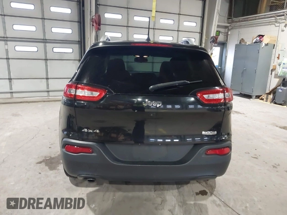2015 Jeep Cherokee Latitude with VIN 1C4PJMCB5FW768854, listed as a IAAI auction lot 41246213 with 131,112 mi miles. Bid and sale history available at carsss.com. Image 16.