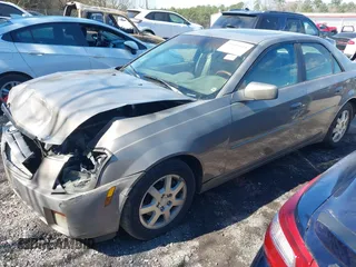 2006 Cadillac CTS z VIN 1G6DP577360126698, wystawiony jako IAAI lot #41666618 z przebiegiem 142 335 mil mil oraz . Historia ofert i sprzedaży dostępna na DreamBid. Obrazek 2.