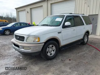 1998 Ford Expedition XLT with VIN 1FMRU1766WLC18376, listed as a IAAI auction lot 41538576 with 176,079 mi miles. Bid and sale history available at carsss.com. Image 2.