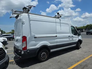 2019 Ford Transit with VIN 1FTYR2CM9KKB04450, listed as a IAAI auction lot 42849742 with 222,192 mi miles and . Bid and sale history available at DreamBid. Image 14.