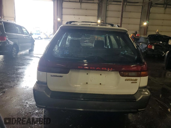 1999 Subaru Legacy Outback with VIN 4S3BG6853X7651034, listed as a Copart auction lot 85968574 with 201,205 mi miles and Salvage title. Bid and sale history available at DreamBid. Image 6.