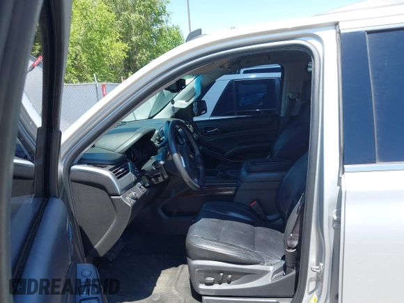 2015 Chevrolet Tahoe LT with VIN 1GNSCBKC9FR111001, listed as a IAAI auction lot 42440624 with 128,087 mi miles and . Bid and sale history available at DreamBid. Image 5.