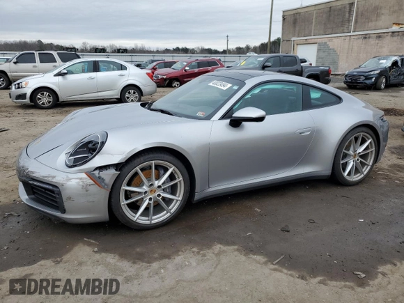 2022 Porsche 911 Carrera with VIN WP0AA2A98NS205474, listed as a Copart auction lot 40023494 with 9,889 mi miles. Bid and sale history available at carsss.com. Image 1.