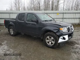 2010 Nissan Frontier LE with VIN 1N6AD0EV0AC436406, listed as a Copart auction lot 43228375 with 165,792 mi miles and Salvage title. Bid and sale history available at DreamBid. Image 4.