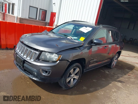 2016 Jeep Compass High Altitude Edition with VIN 1C4NJCEA4GD806920, listed as a IAAI auction lot 41163826 with 129,104 mi miles. Bid and sale history available at carsss.com. Image 2.