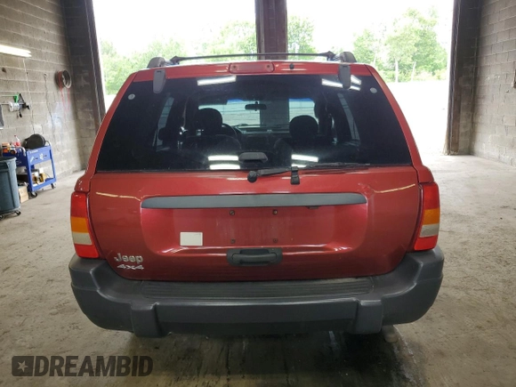 2004 Jeep Grand Cherokee Laredo with VIN 1J4GW48S04C164745, listed as a Copart auction lot 64036725 with 163,054 mi miles and Salvage title. Bid and sale history available at DreamBid. Image 6.