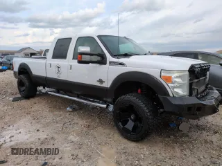 2011 Ford F-250 XL with VIN 1FT7W2BT4BED11873, listed as a Copart auction lot 51128315 with 312,318 mi miles and Salvage title. Bid and sale history available at DreamBid. Image 4.