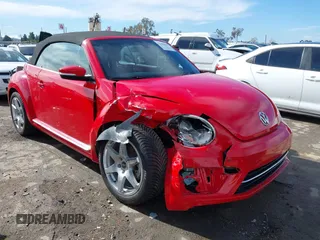 2019 Volkswagen Beetle S with VIN 3VW5DAAT9KM506464, listed as a IAAI auction lot 41382376 with 24,992 mi miles and . Bid and sale history available at DreamBid. Image 1.