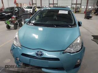 2014 Toyota Prius One z VIN JTDKDTB3XE1060360, wystawiony jako IAAI lot #41972531 z przebiegiem 140 012 mil mil oraz . Historia ofert i sprzedaży dostępna na DreamBid. Obrazek 12.