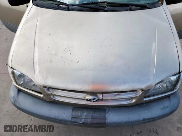 2000 Toyota Sienna LE with VIN 4T3ZF13C2YU218417, listed as a Copart auction lot 63328035 with 263,439 mi miles and Salvage title. Bid and sale history available at DreamBid. Image 12.