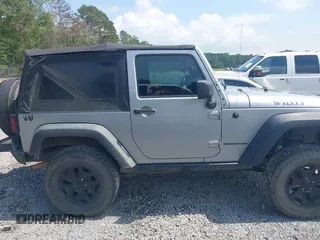 2015 Jeep Wrangler Freedom Edition with VIN 1C4AJWAG4FL589769, listed as a IAAI auction lot 42704488 with 194,414 mi miles and . Bid and sale history available at DreamBid. Image 13.