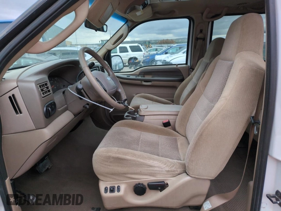 2004 Ford Excursion Special Serv with VIN 1FMNU41L04EB33694, listed as a Copart auction lot 55959735 with 183,692 mi miles and Salvage title. Bid and sale history available at DreamBid. Image 7.