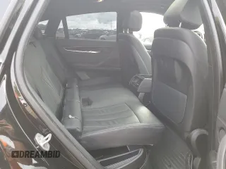 2018 BMW X6 xDrive35i with VIN 5UXKU2C56J0X50180, listed as a Copart auction lot 66432553 with 55,700 mi miles. Bid and sale history available at carsss.com. Image 11.