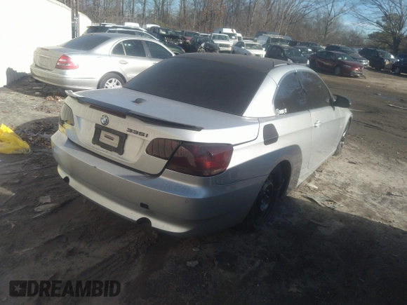2007 BMW 3 Series 335i with VIN WBAWL73587PX49287, listed as a IAAI auction lot 41454028 with 182,630 mi miles. Bid and sale history available at carsss.com. Image 4.