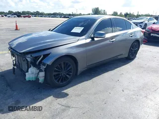 2014 Infiniti Q50 Premium with VIN JN1BV7AP7EM684448, listed as a IAAI auction lot 42564087 with 79,207 mi miles and . Bid and sale history available at DreamBid. Image 2.