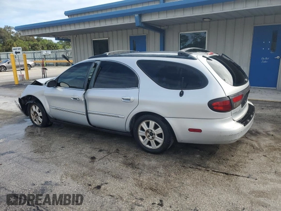 2003 Ford Taurus z VIN 1FAHP59U73A217826, wystawiony jako Copart lot #80059964 z przebiegiem 315 560 mil mil oraz Szkody całkowita. Historia ofert i sprzedaży dostępna na DreamBid. Obrazek 2.