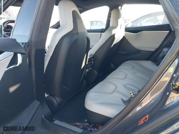 2016 Tesla Model S 90D with VIN 5YJSA1E20GF128496, listed as a IAAI auction lot 41214785 with 126,671 mi miles. Bid and sale history available at carsss.com. Image 8.