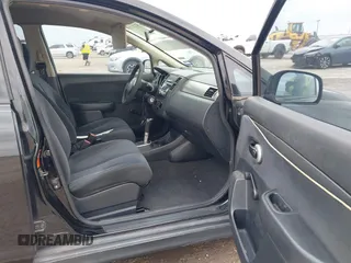 2009 Nissan Versa 1.8 SL with VIN 3N1BC13E79L393141, listed as a IAAI auction lot 42124776 with 233,137 mi miles. Bid and sale history available at carsss.com. Image 5.