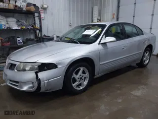 2003 Pontiac Bonneville SE with VIN 1G2HX52K734152756, listed as a IAAI auction lot 41482255 with 219,472 mi miles. Bid and sale history available at carsss.com. Image 2.