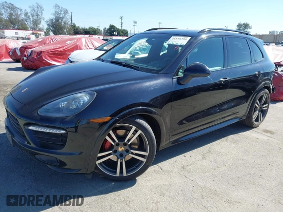 2014 Porsche Cayenne GTS z VIN WP1AD2A24ELA76457, wystawiony jako IAAI lot #41538390 z przebiegiem 101 082 mil mil oraz . Historia ofert i sprzedaży dostępna na DreamBid. Obrazek 2.