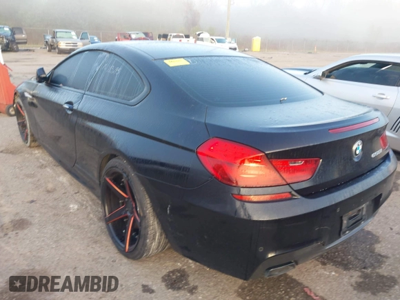 2015 BMW 6 Series 650i with VIN WBAYM9C59FD248412, listed as a IAAI auction lot 41855265 with 1,032,951 mi miles and . Bid and sale history available at DreamBid. Image 3.