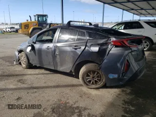 2021 Toyota Prius LE with VIN JTDKAMFP0M3182773, listed as a Copart auction lot 45600385 with 72,923 mi miles and Salvage Title. Bid and sale history available at DreamBid. Image 2.
