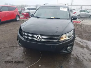 2012 Volkswagen Tiguan SE with VIN WVGAV7AX0CW602713, listed as a IAAI auction lot 41558520 with 95,678 mi miles and . Bid and sale history available at DreamBid. Image 12.
