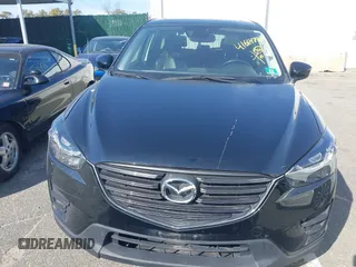 2016 Mazda CX-5 Grand Touring with VIN JM3KE4DY5G0681436, listed as a IAAI auction lot 41664780 with 172,199 mi miles. Bid and sale history available at carsss.com. Image 6.