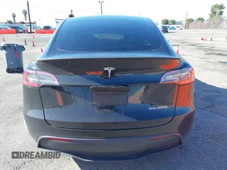 2022 Tesla Model Y Performance with VIN 7SAYGDEF5NF336693, listed as a IAAI auction lot 41805752 with 42,009 mi miles and . Bid and sale history available at DreamBid. Image 15.