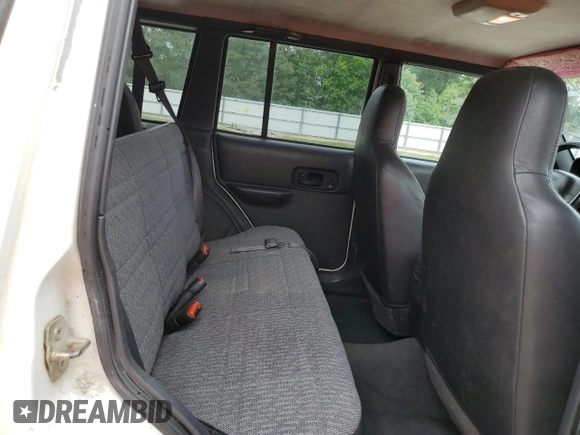 2001 Jeep Cherokee Sport with VIN 1J4FF48S31L520760, listed as a Copart auction lot 59807625 with 298,489 mi miles and Salvage title. Bid and sale history available at DreamBid. Image 11.