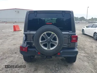 2018 Jeep Wrangler Unlimited Sahara with VIN 1C4HJXEN8JW303023, listed as a IAAI auction lot 42138631 with 72,463 mi miles and . Bid and sale history available at DreamBid. Image 16.