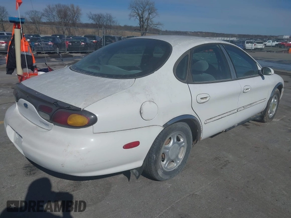 1996 Ford Taurus GL z VIN 1FALP52U0TG128147, wystawiony jako IAAI lot #41604450 z przebiegiem 152 949 mil mil oraz . Historia ofert i sprzedaży dostępna na DreamBid. Obrazek 4.