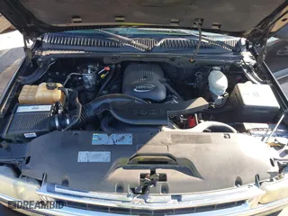2003 Chevrolet Tahoe LS with VIN 1GNEC13V63R245581, listed as a IAAI auction lot 41599241 with 234,028 mi miles. Bid and sale history available at carsss.com. Image 10.