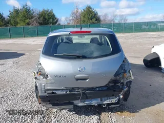 2009 Nissan Versa 1.8 SL with VIN 3N1BC13E69L390702, listed as a IAAI auction lot 41202841 with 33,709 mi miles. Bid and sale history available at carsss.com. Image 6.
