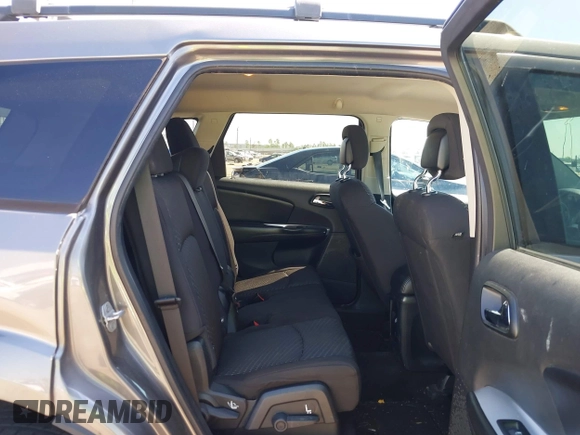 2013 Dodge Journey SXT with VIN 3C4PDDBGXDT650886, listed as a IAAI auction lot 41864331 with 224,579 mi miles and . Bid and sale history available at DreamBid. Image 8.