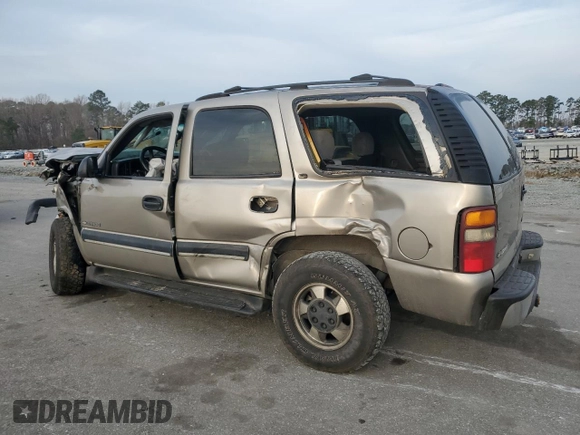 2001 Chevrolet Tahoe LS z VIN 1GNEC13T81J212124, wystawiony jako Copart lot #49049865 z przebiegiem 245 904 mil mil oraz Szkoda całkowita • Salvage title. Historia ofert i sprzedaży dostępna na DreamBid. Obrazek 2.