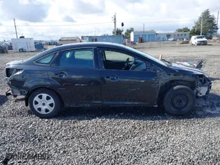 2014 Ford Focus S with VIN 1FADP3E29EL176811, listed as a IAAI auction lot 41808719 with 84,600 mi miles. Bid and sale history available at carsss.com. Image 14.